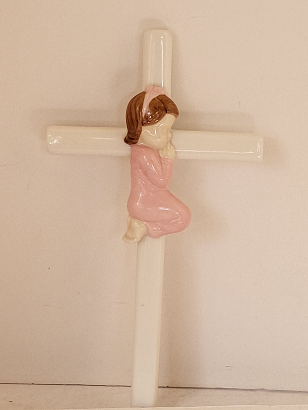 White Porcelain Cross Wall Decor with Pink Praying Girl Roman Inc.